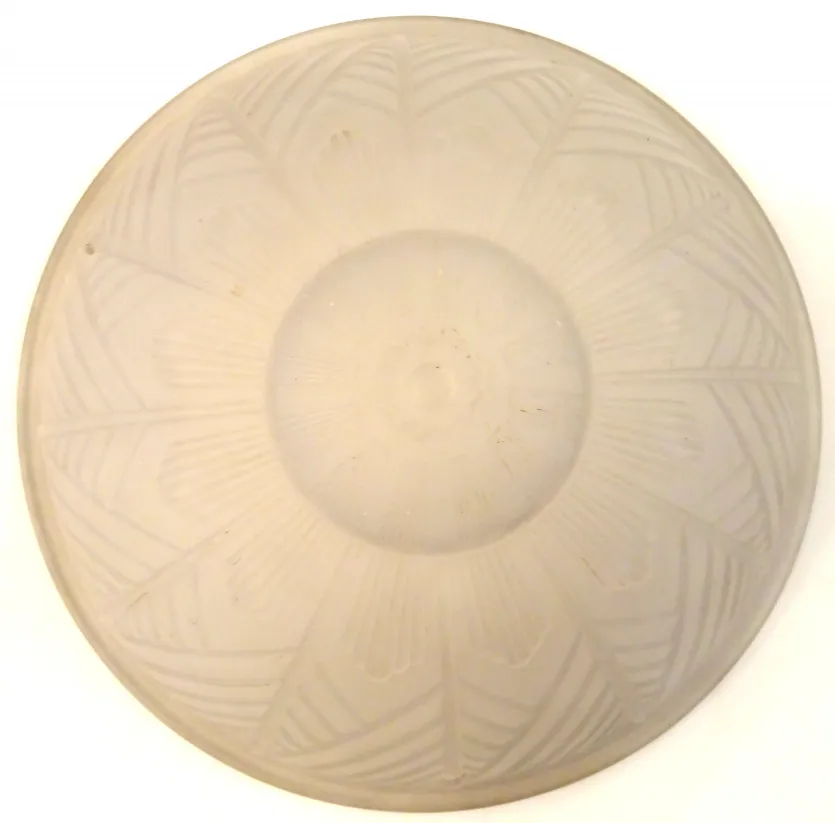 antique round ceiling light with raised decorative design