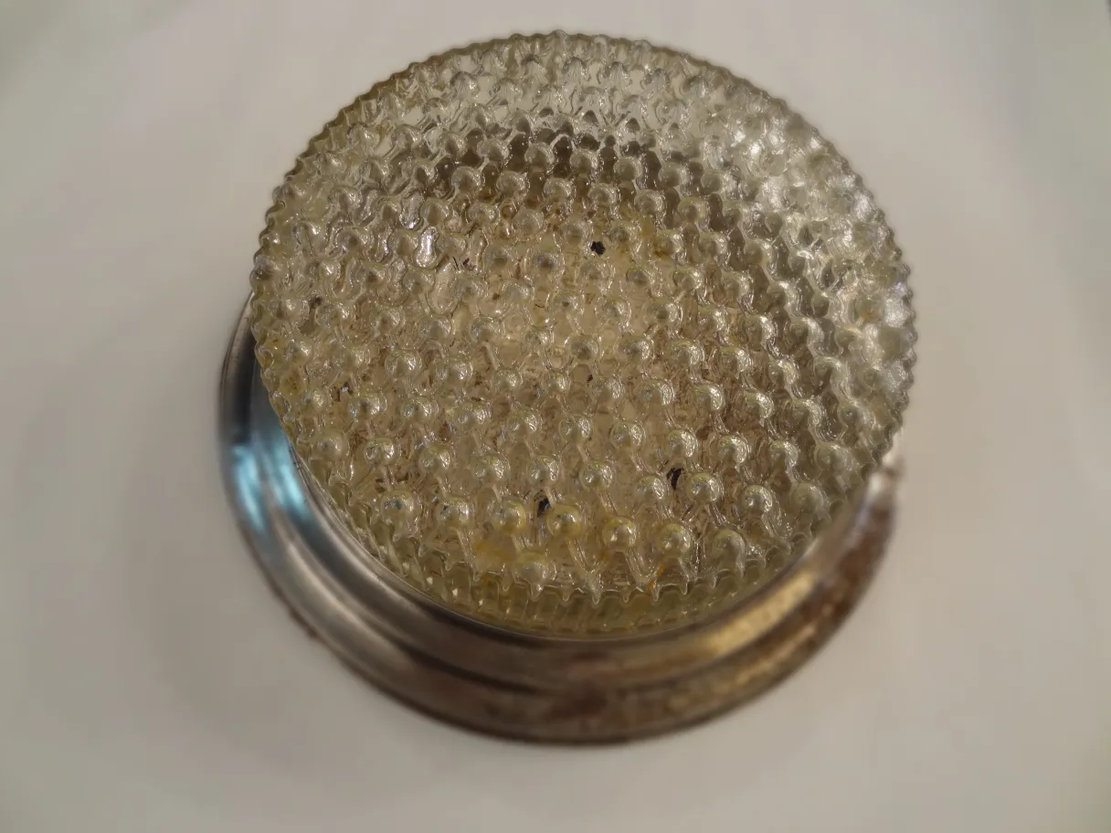 antique ceiling light with decorative textured design