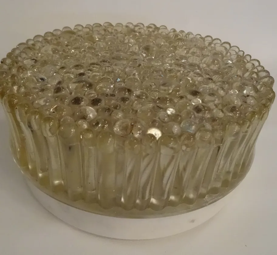 antique ceiling light with bubble texture in neutral setting