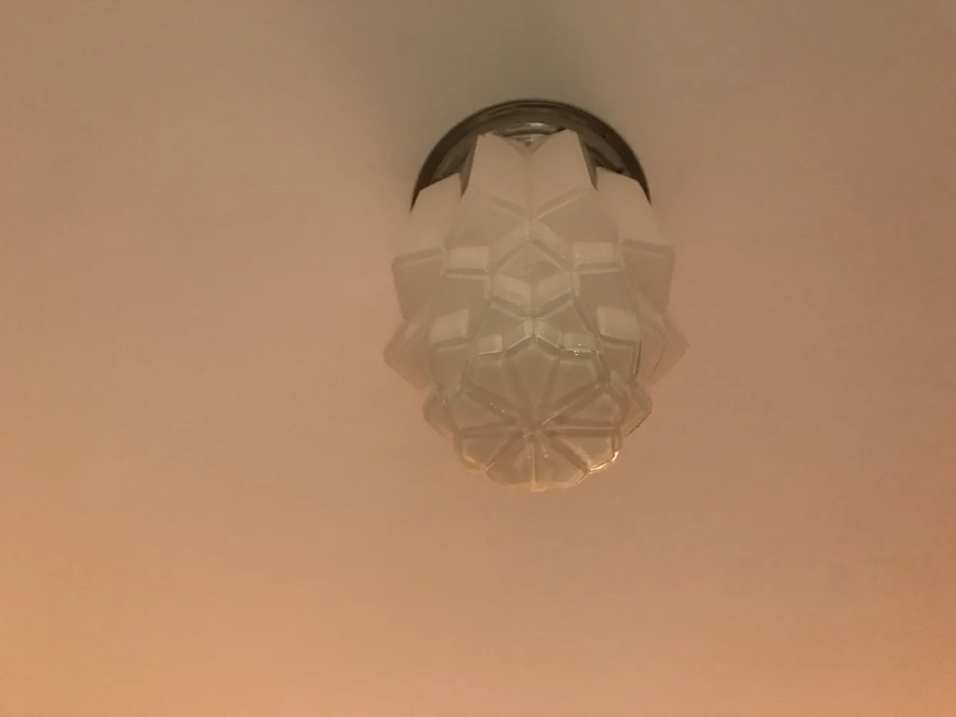 2 antique ceiling lights, illuminating a room with classic design