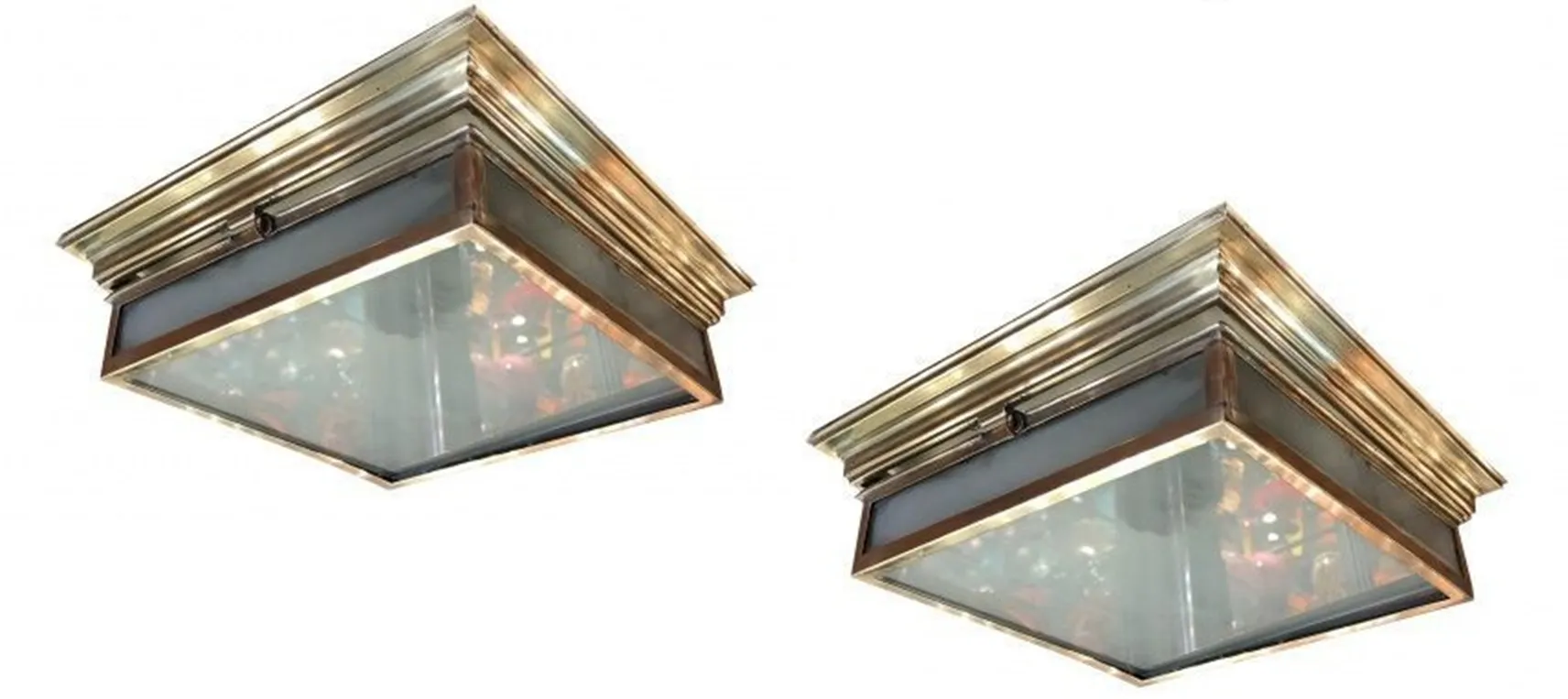 Two antique ceiling lights, featuring a rectangular design, perfect for home decor.