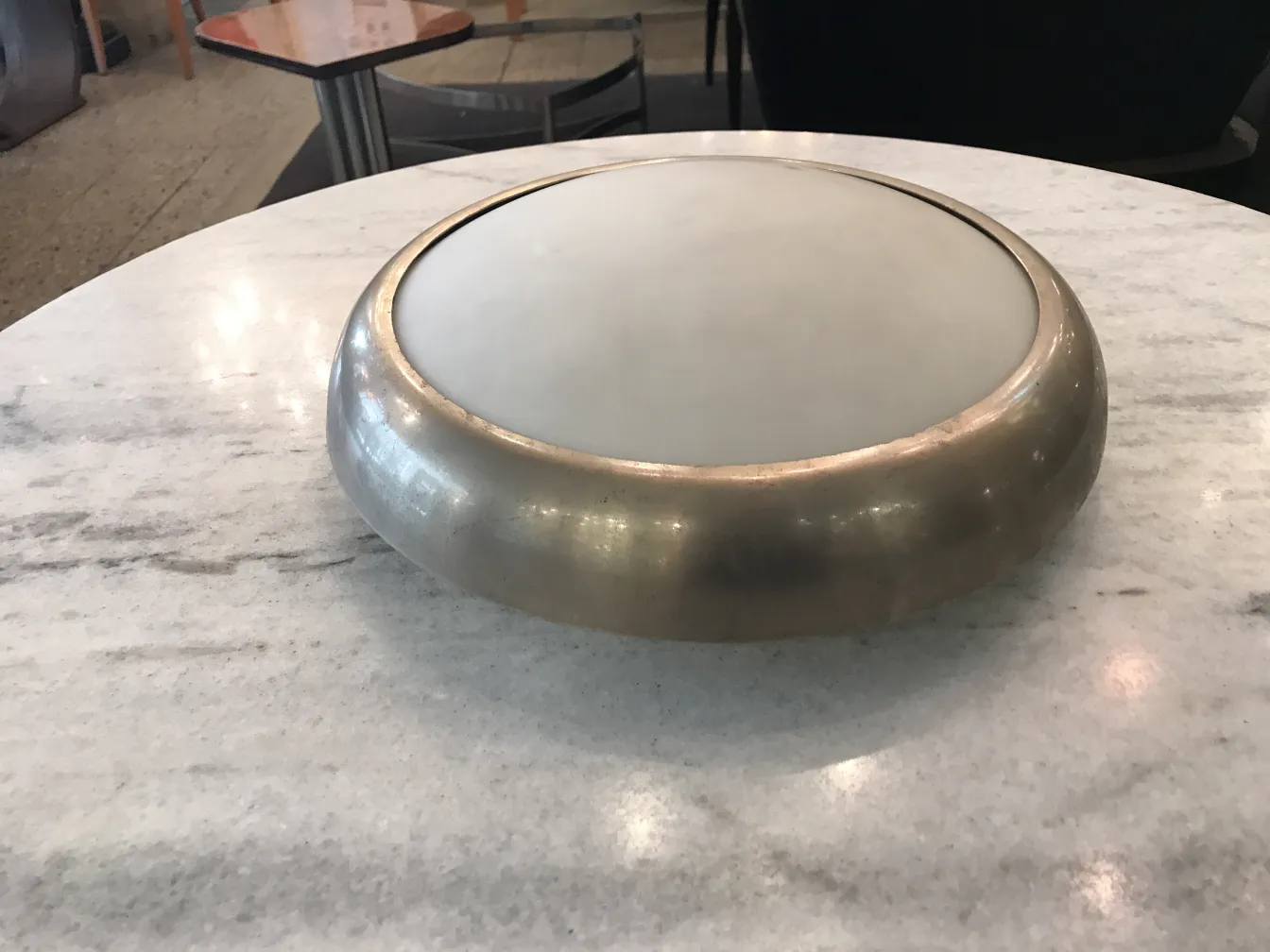 Antique ceiling lights with round shape and elegant style, on a table