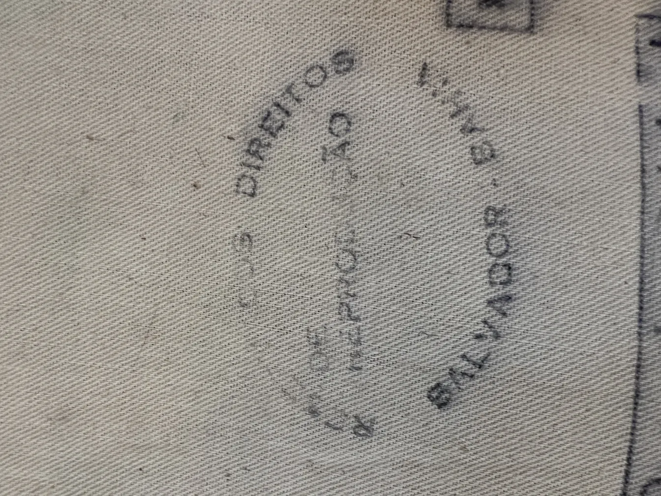 antique tapestry with decorative details on the surface