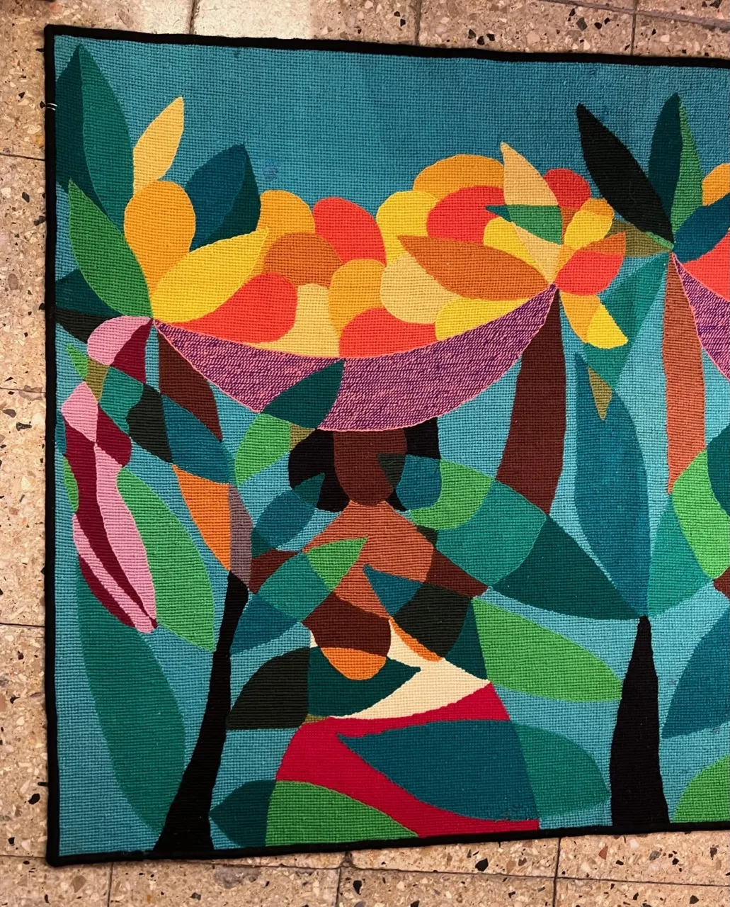 antique colorful tapestry featuring floral and fruit design