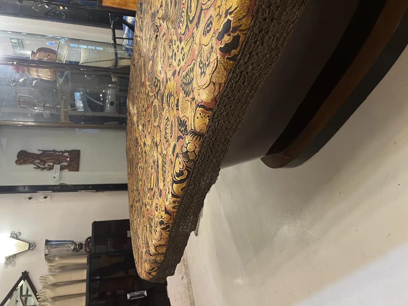 antique tablecloth in a decorative setting with furniture