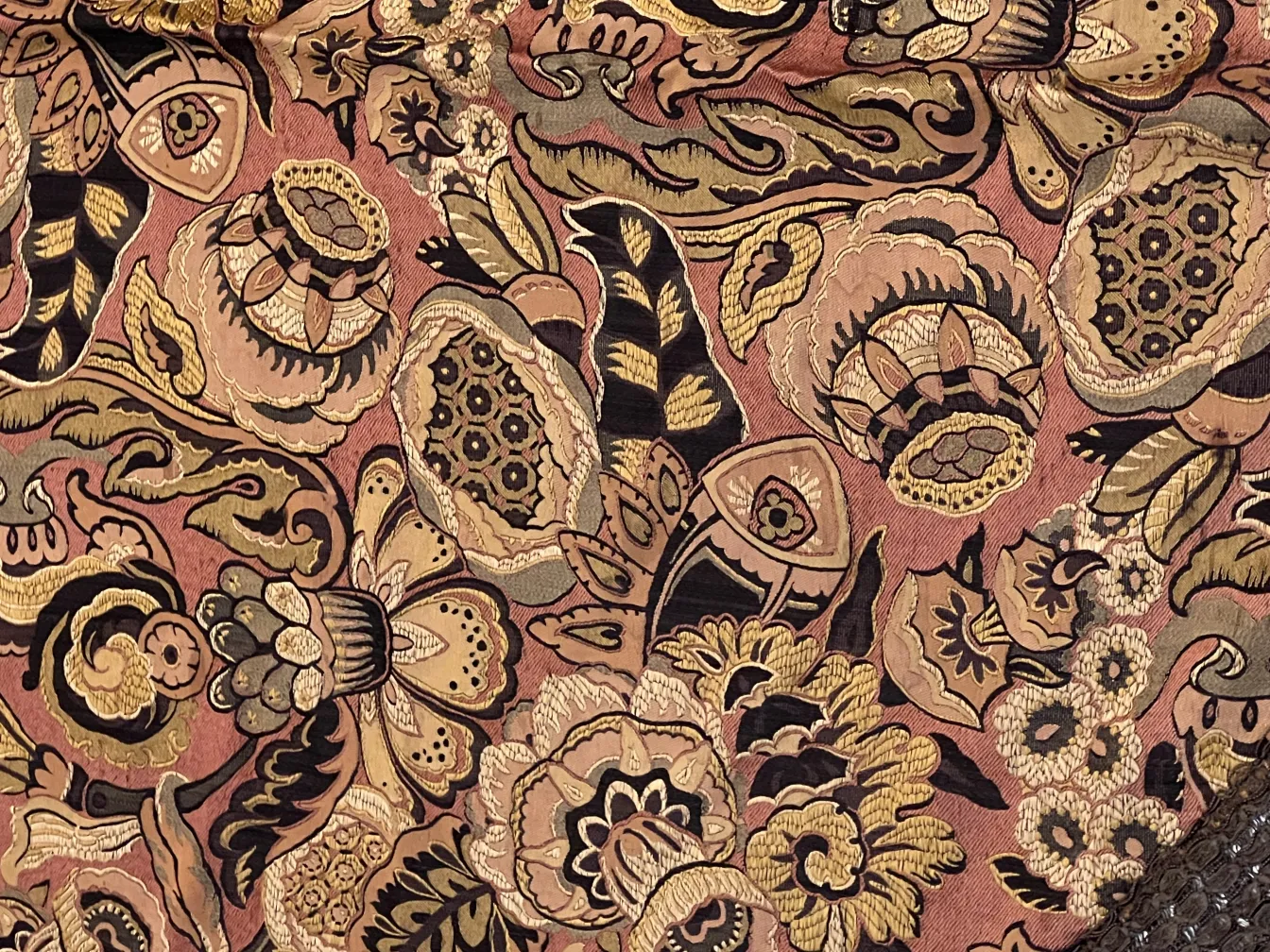 antique tablecloth with pink and gold floral patterns