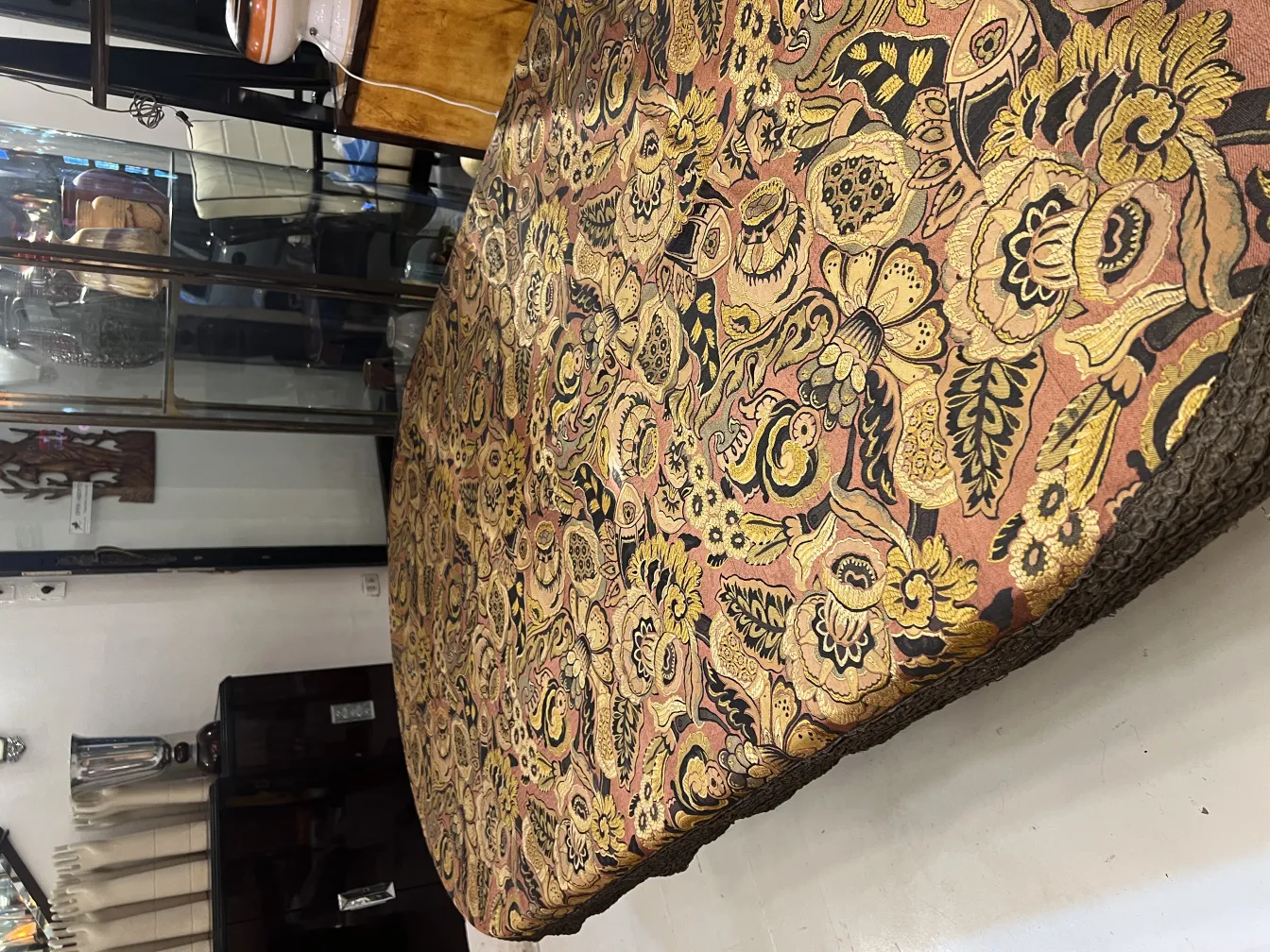 antique tablecloth with vibrant floral patterns in context