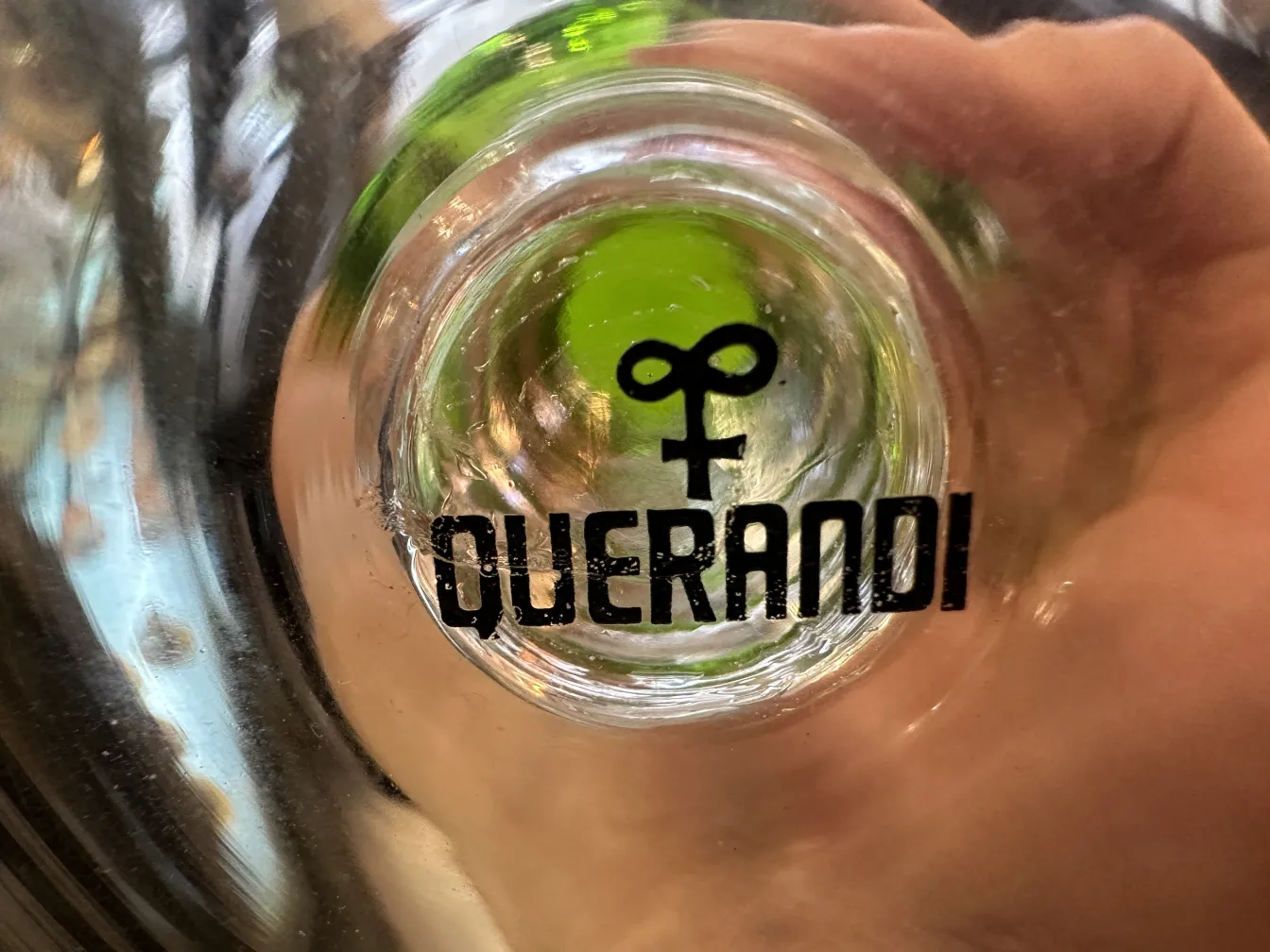 12 glasses querandi on a reflective surface
