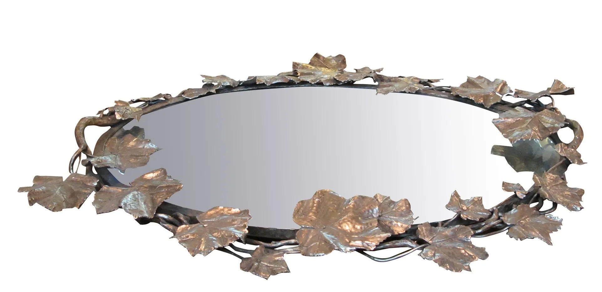 oval antique tray with intricate leaf details