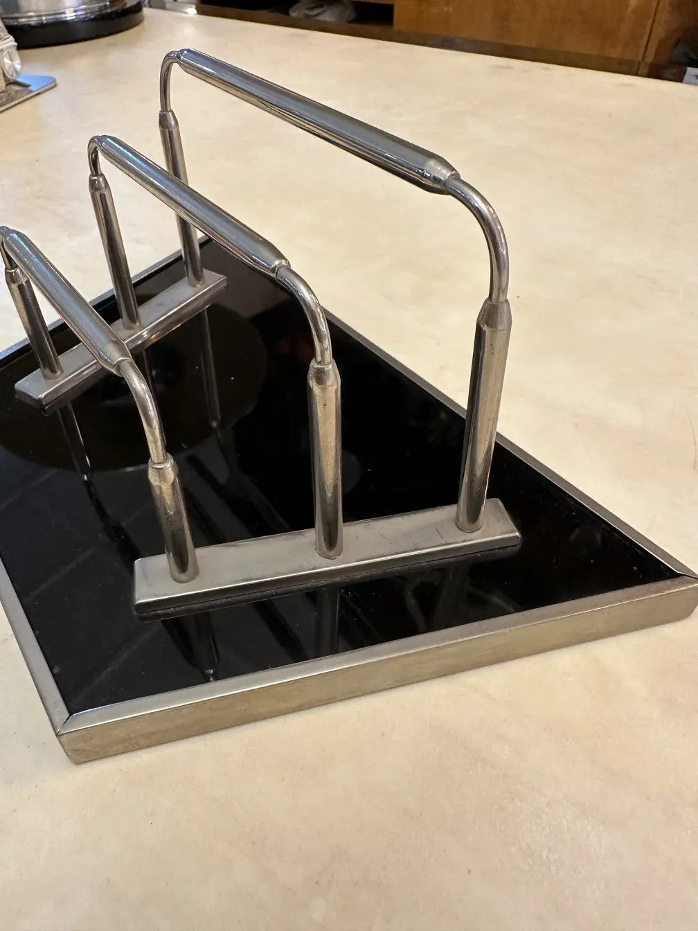 antique WMF card tray with decorative arms in an elegant setting