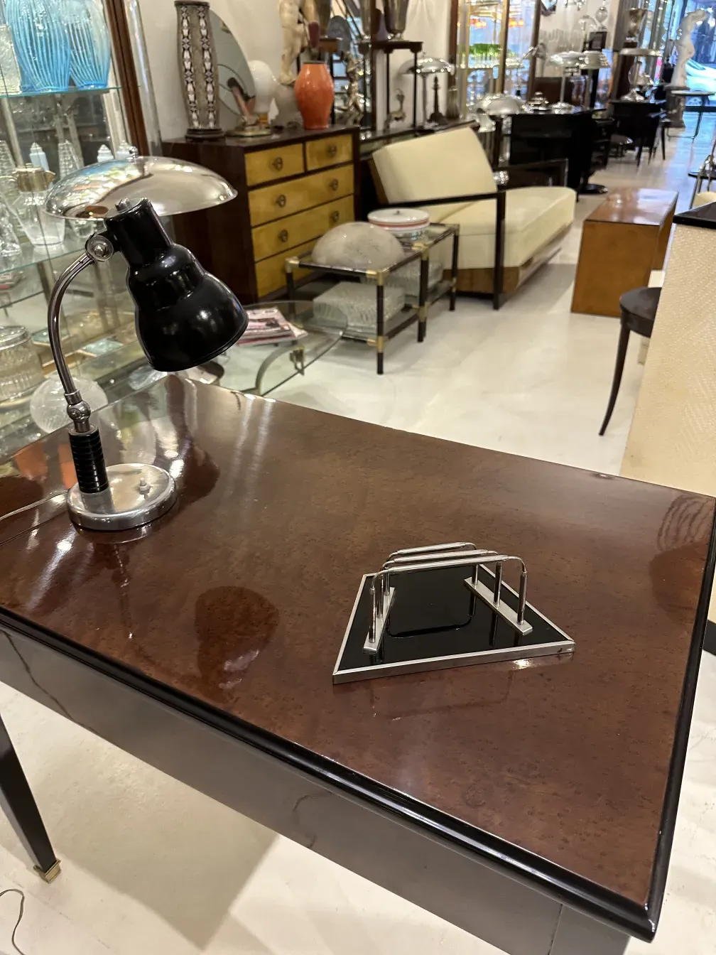 antique WMF card tray on a desk with a lamp