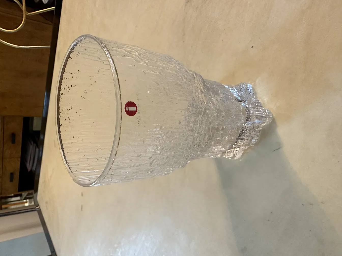 Antique tapio wirkkala glasses with textured appearance on the table.