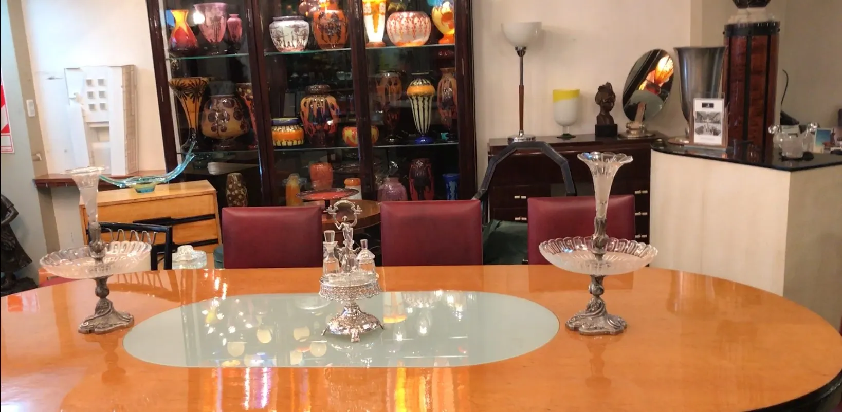 Antique set of salt shaker, pepper shaker, oil and vinegar by WMF, featuring fine details in the background.