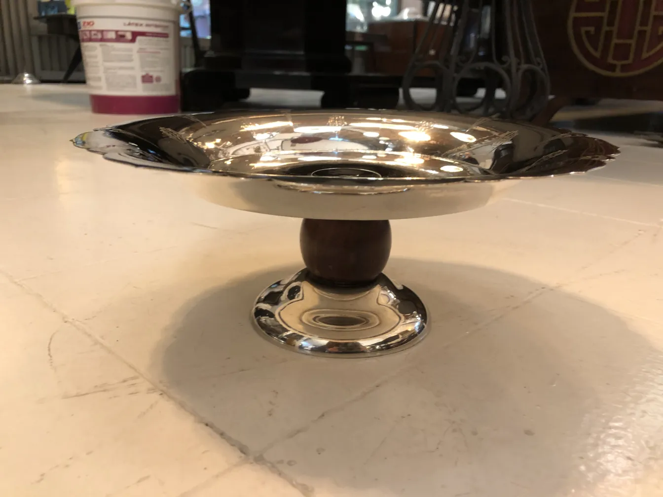 Antique pastry plate with base in a decorative setting