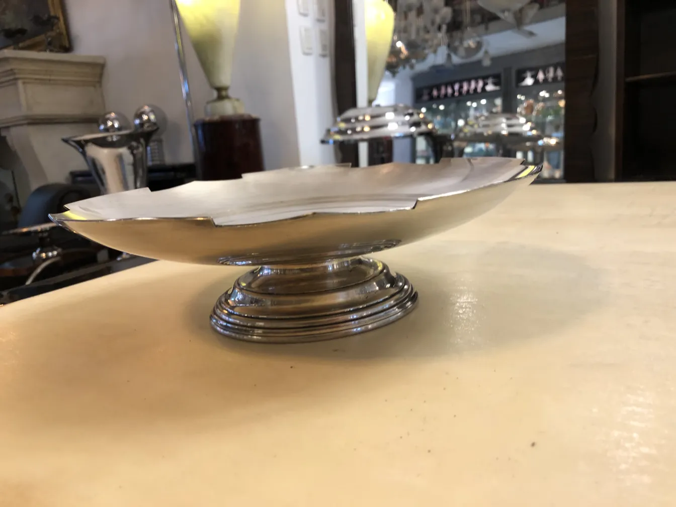 Antique pastry plate with decorative edge, elegant style.