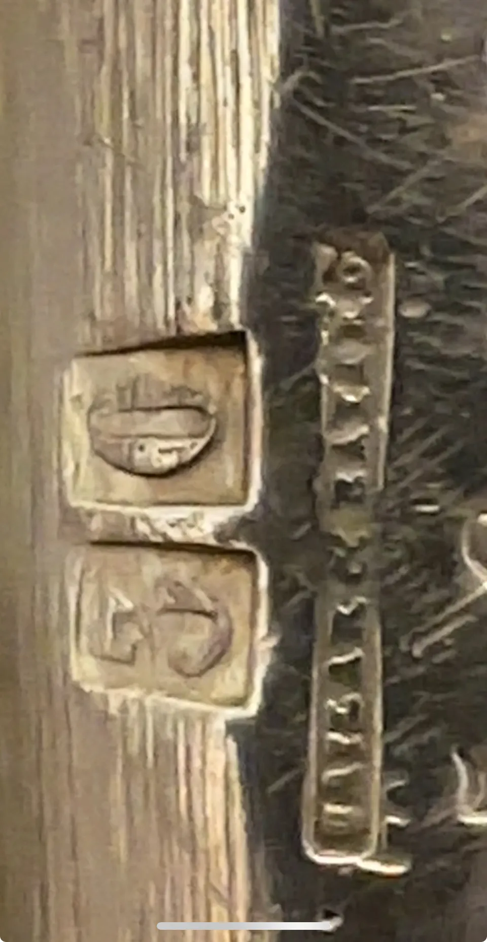 Antique pastry plate with intricate decoration and visible stamps.