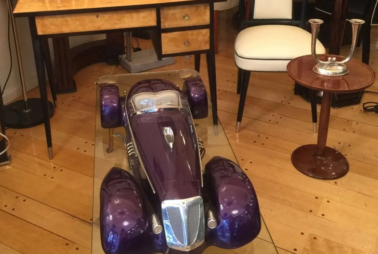 Antique car by designer Marcelo Peña in a stylish setting