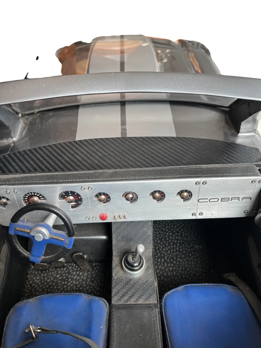 designer car interior featuring blue and black details