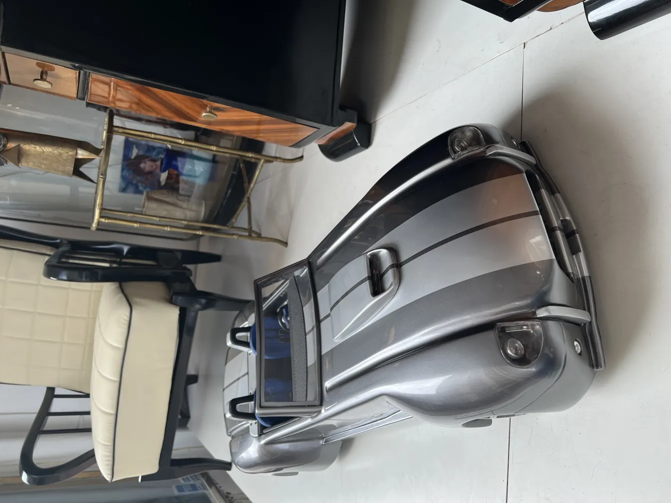 designer antique car Marcelo Peña in a stylish setting