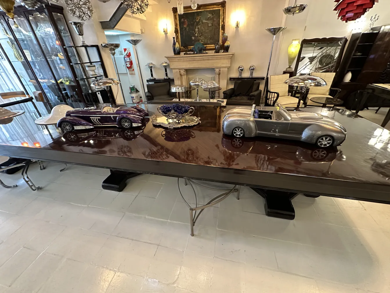 Antique model of designer Marcelo Peña's car with elegant details on a modern table.