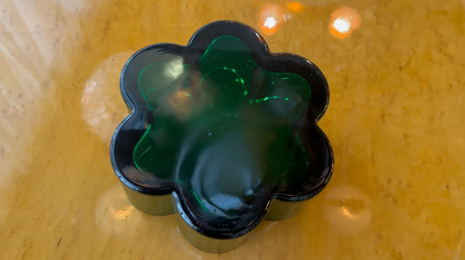 antique flower-shaped centerpiece in green color