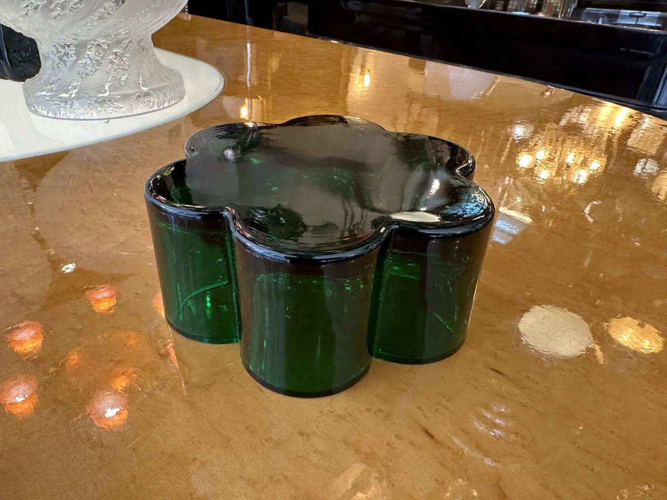 antique centerpiece shaped like a flower in green colors