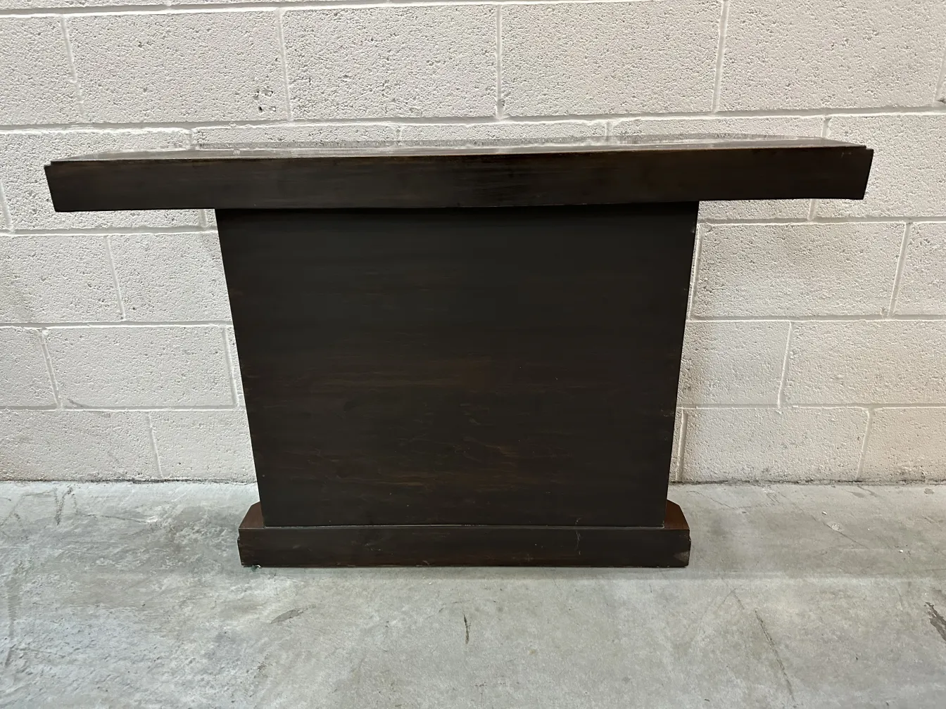 antique consoles in a neutral environment with wall