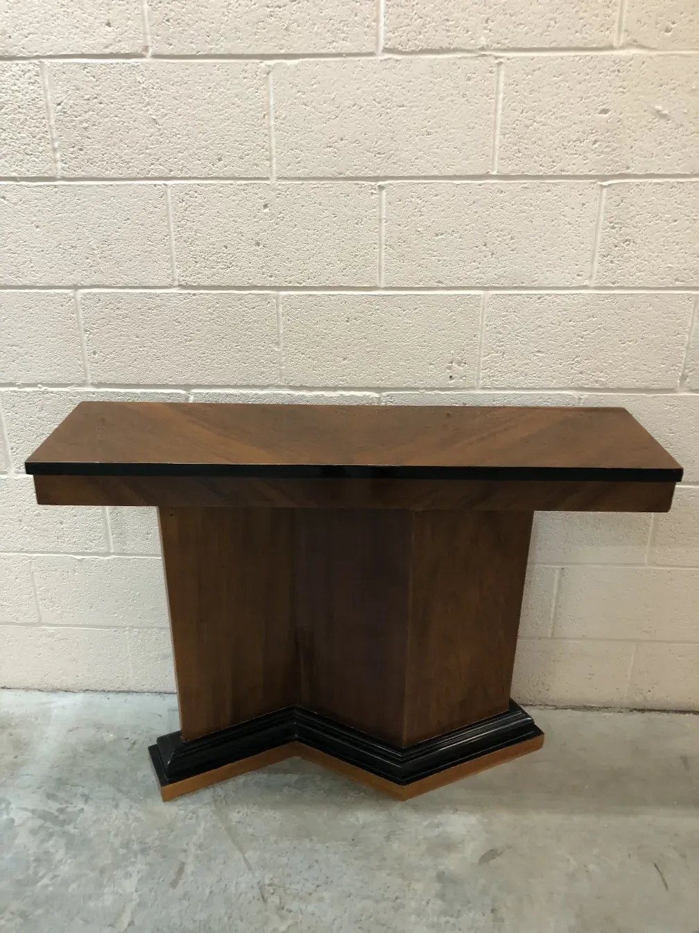 Two antique consoles, elegant design, wooden color, classic environment.