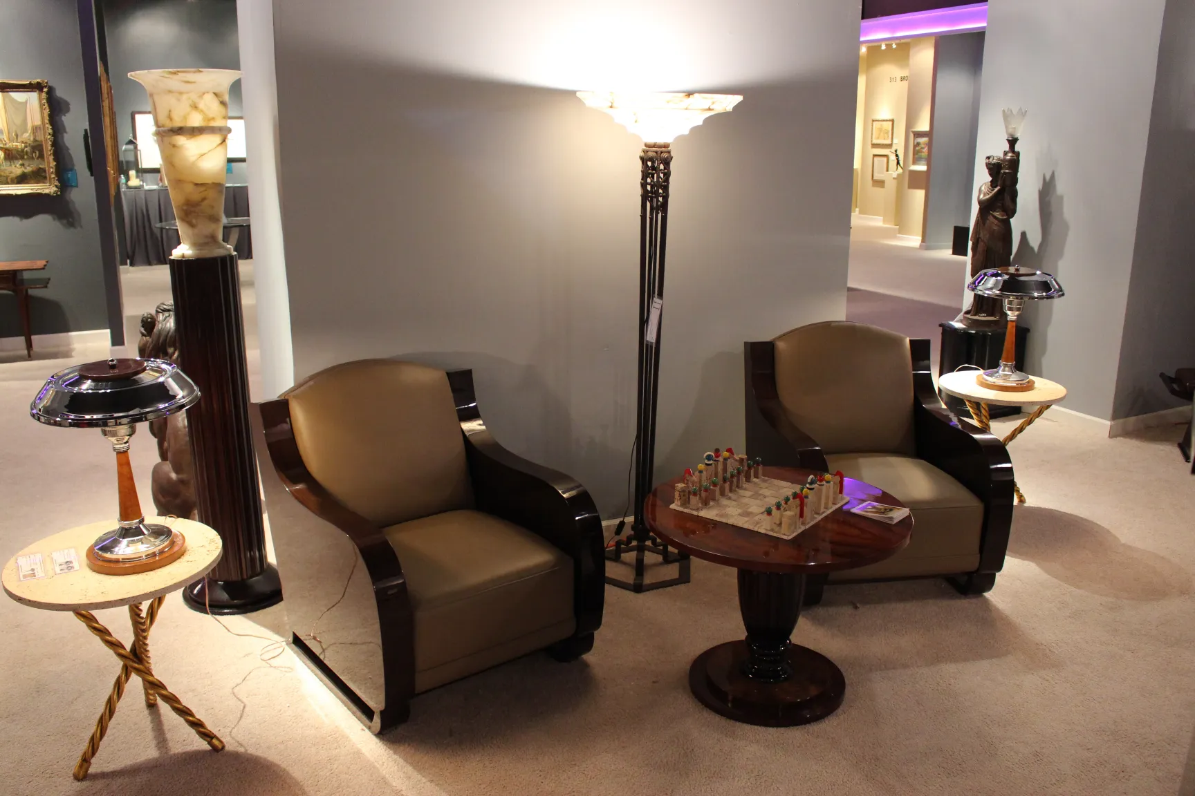 Two antique table lamps in an elegant setting