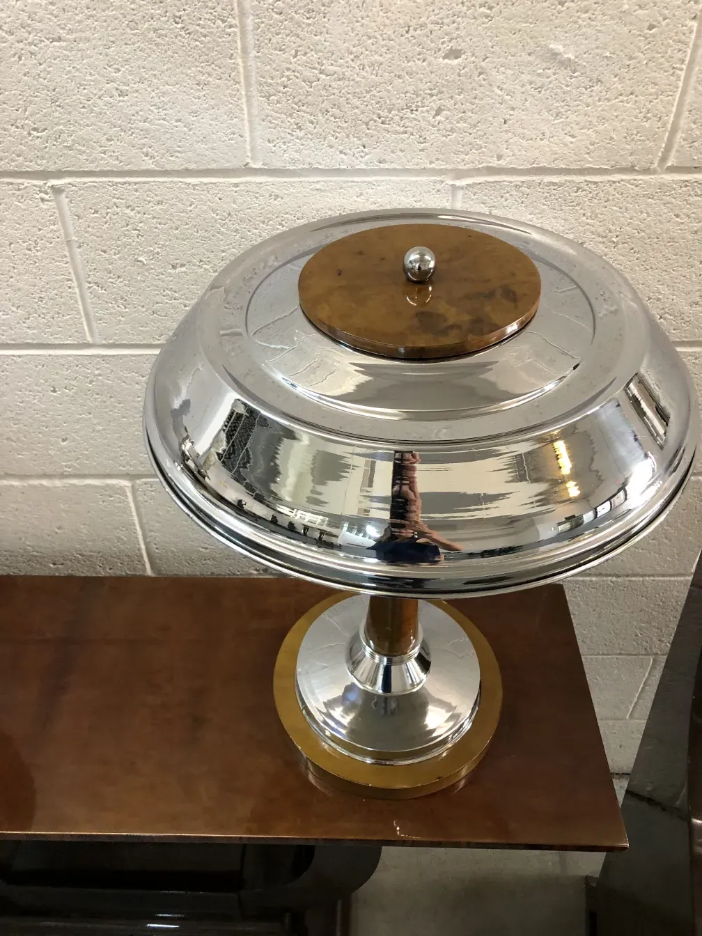 Set of two antique table lamps with shiny bases and elegant design.