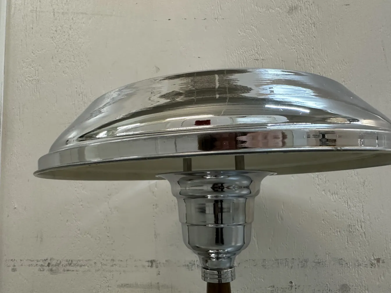 Close-up of two antique table lamps with shiny design