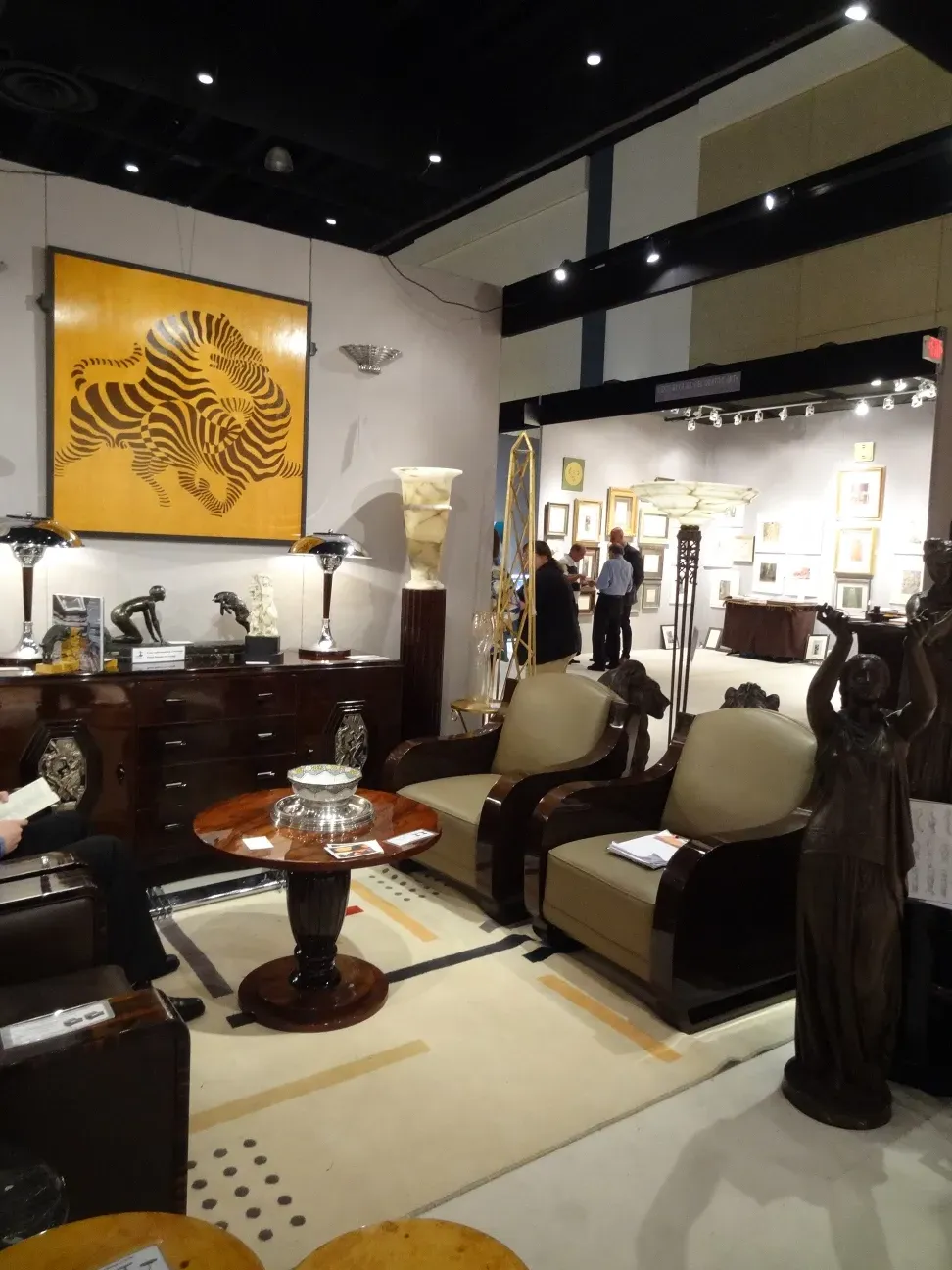 two antique table lamps in an elegant decorative setting with stylish furniture