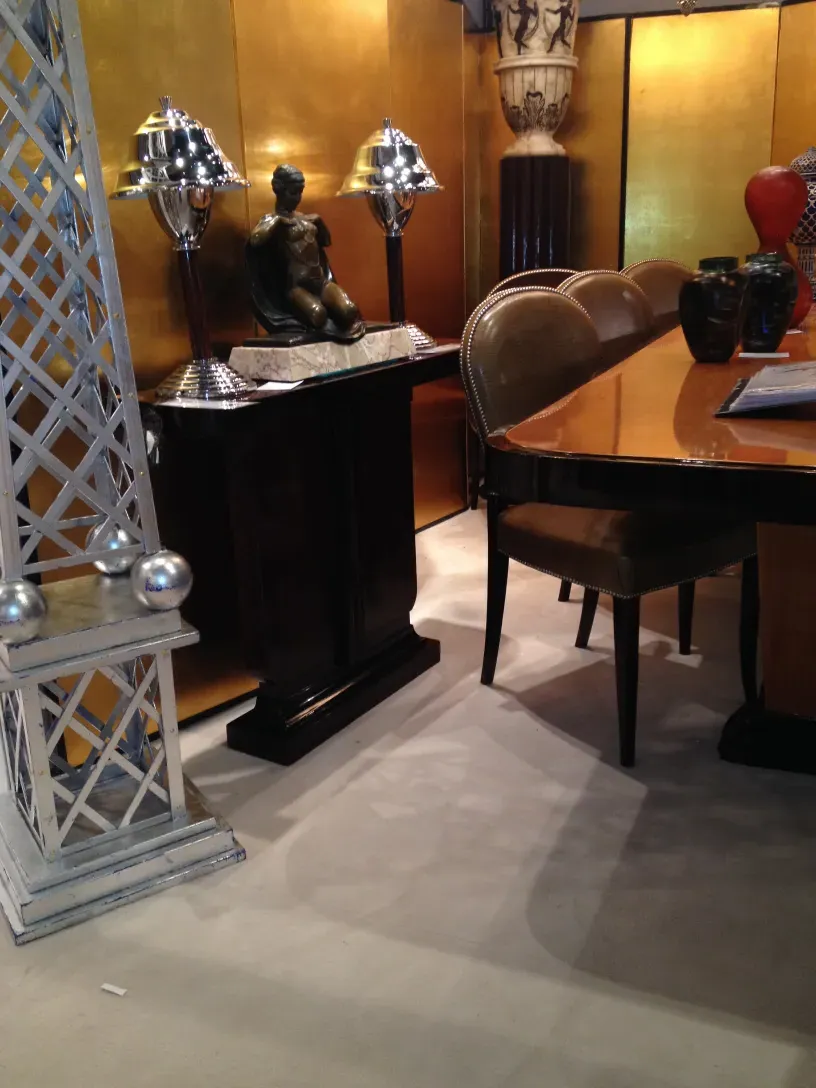 two antique table lamps with shiny bases, illuminating an elegant space.