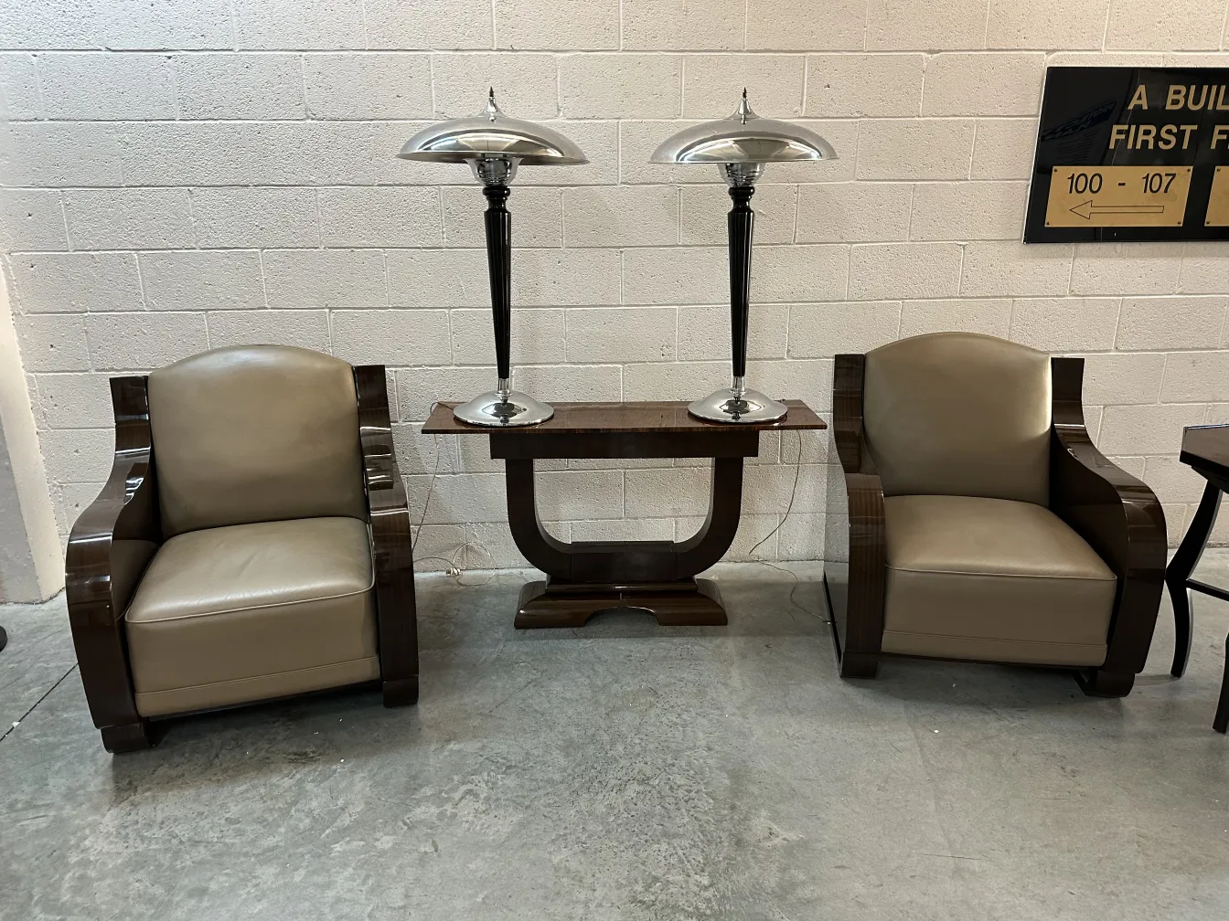 Two antique table lamps with elegant bases in a cozy environment.