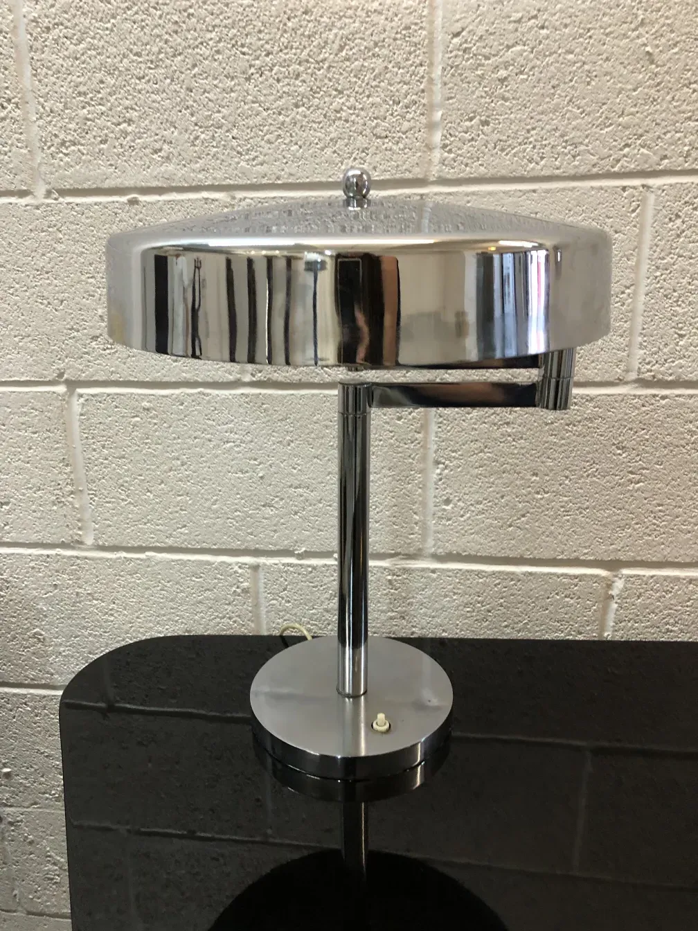 antique table lamp with black base and shiny shade