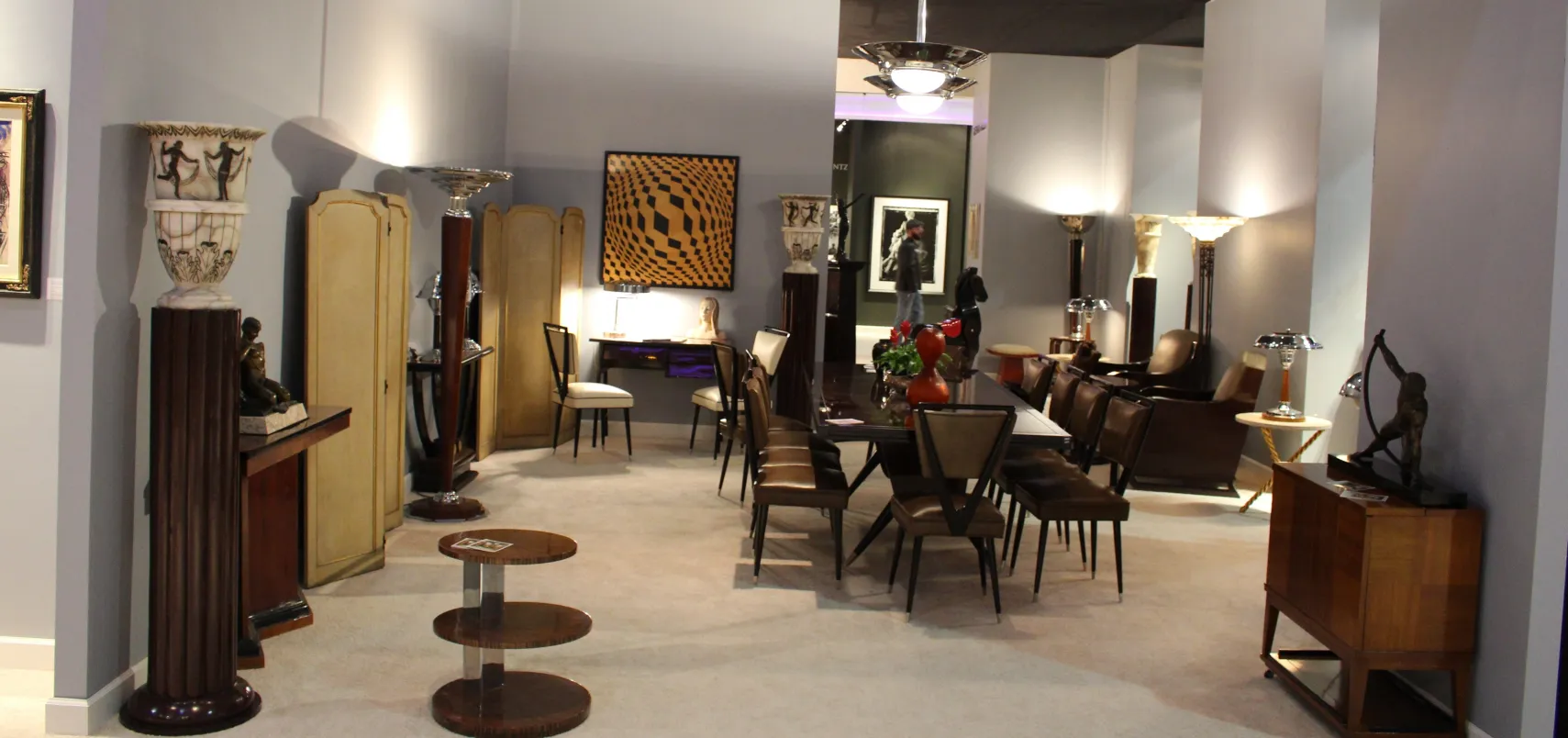 Set of 2 floor lamps in an antique setting with modern art