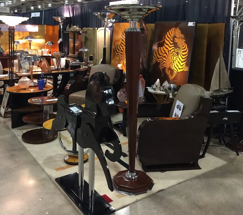 Two antique floor lamps in an antique environment.