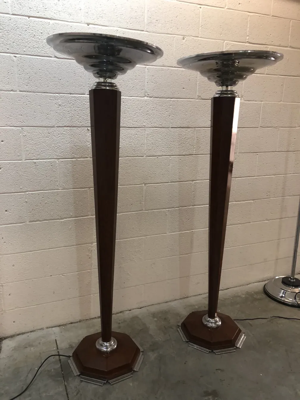 Set of 2 antique floor lamps with elegant bases and glass shades