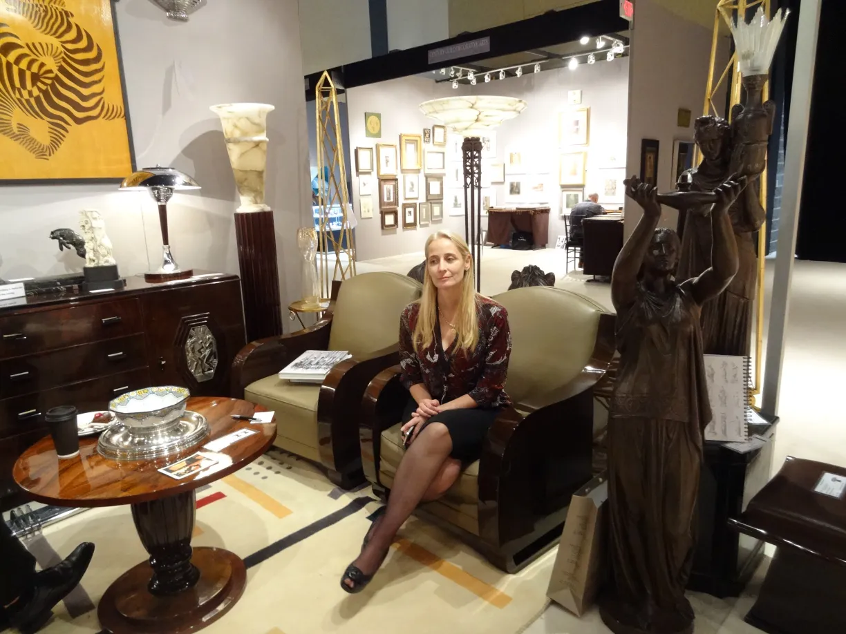 Two antique floor lamps in a modern setting with elegant decor.