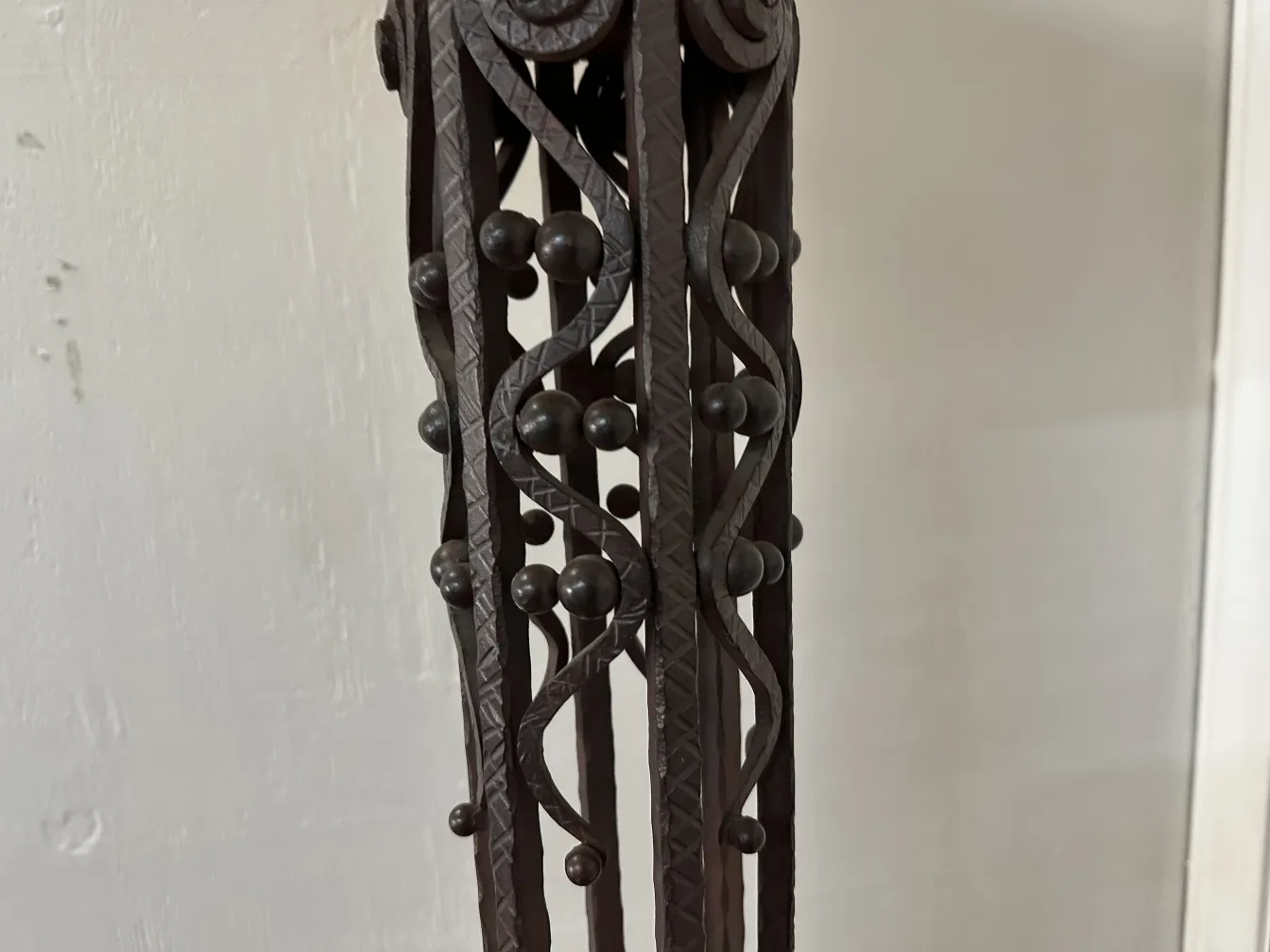 two antique floor lamps with decorative design