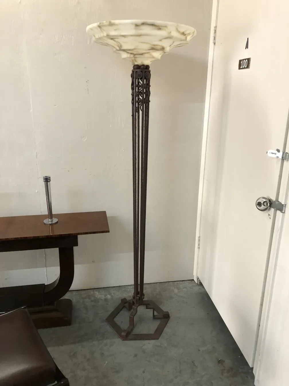 two antique floor lamps in a cozy setting
