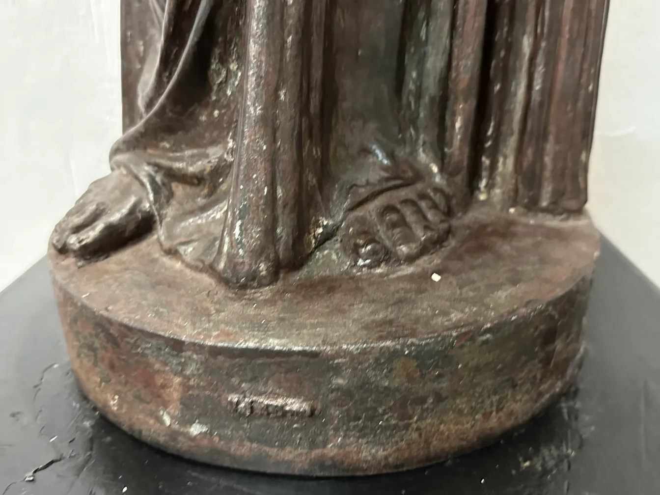 two antique floor lamps with decorative details