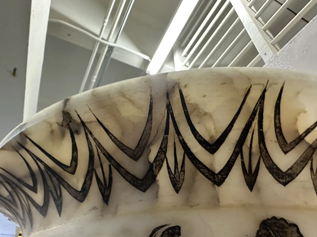 Two antique floor lamps with elegant decorations in a cozy setting.