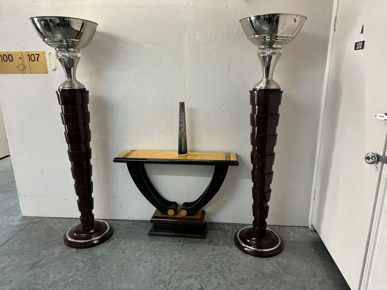 two antique floor lamps with elegant bases