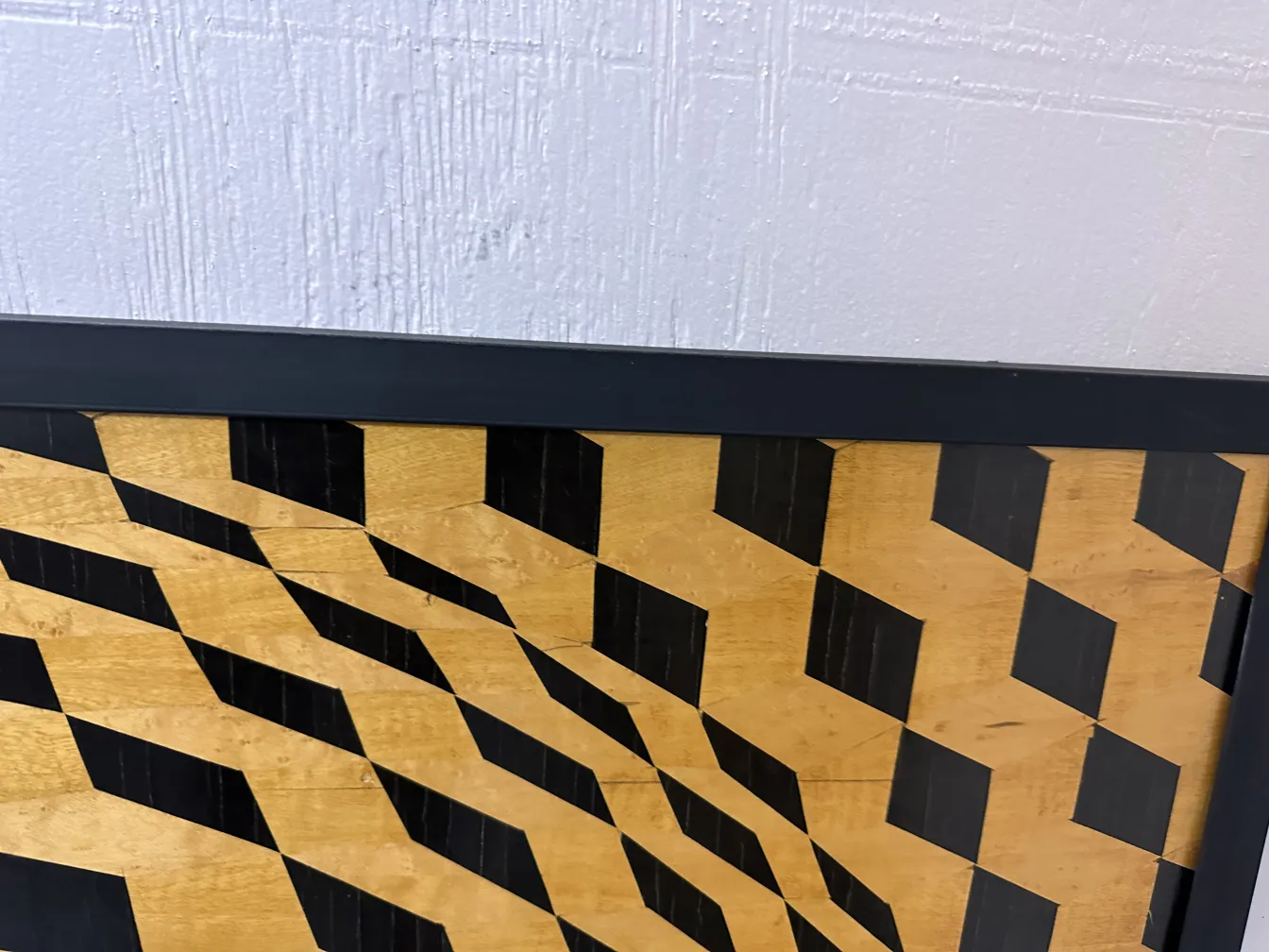 antique marquetry with geometric design in beige and black