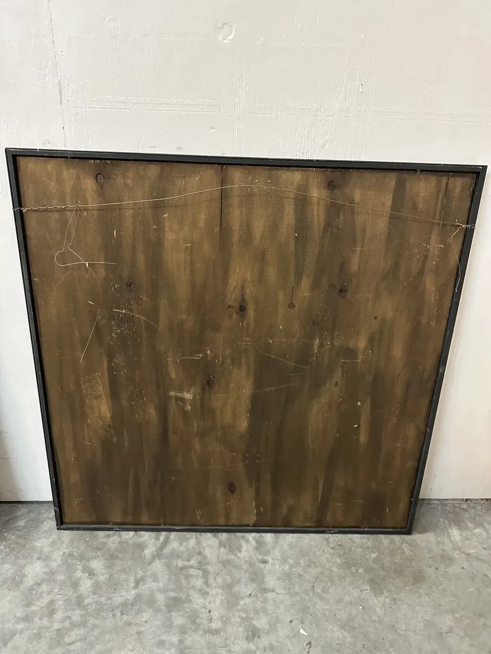 Antique decorative marquetry with a shiny finish and subtle details, light background.