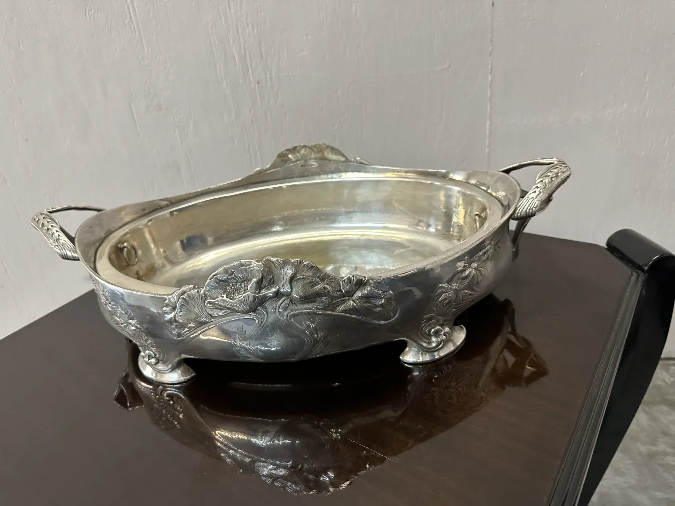 antique centerpiece gallia with embossed details and decorative handles