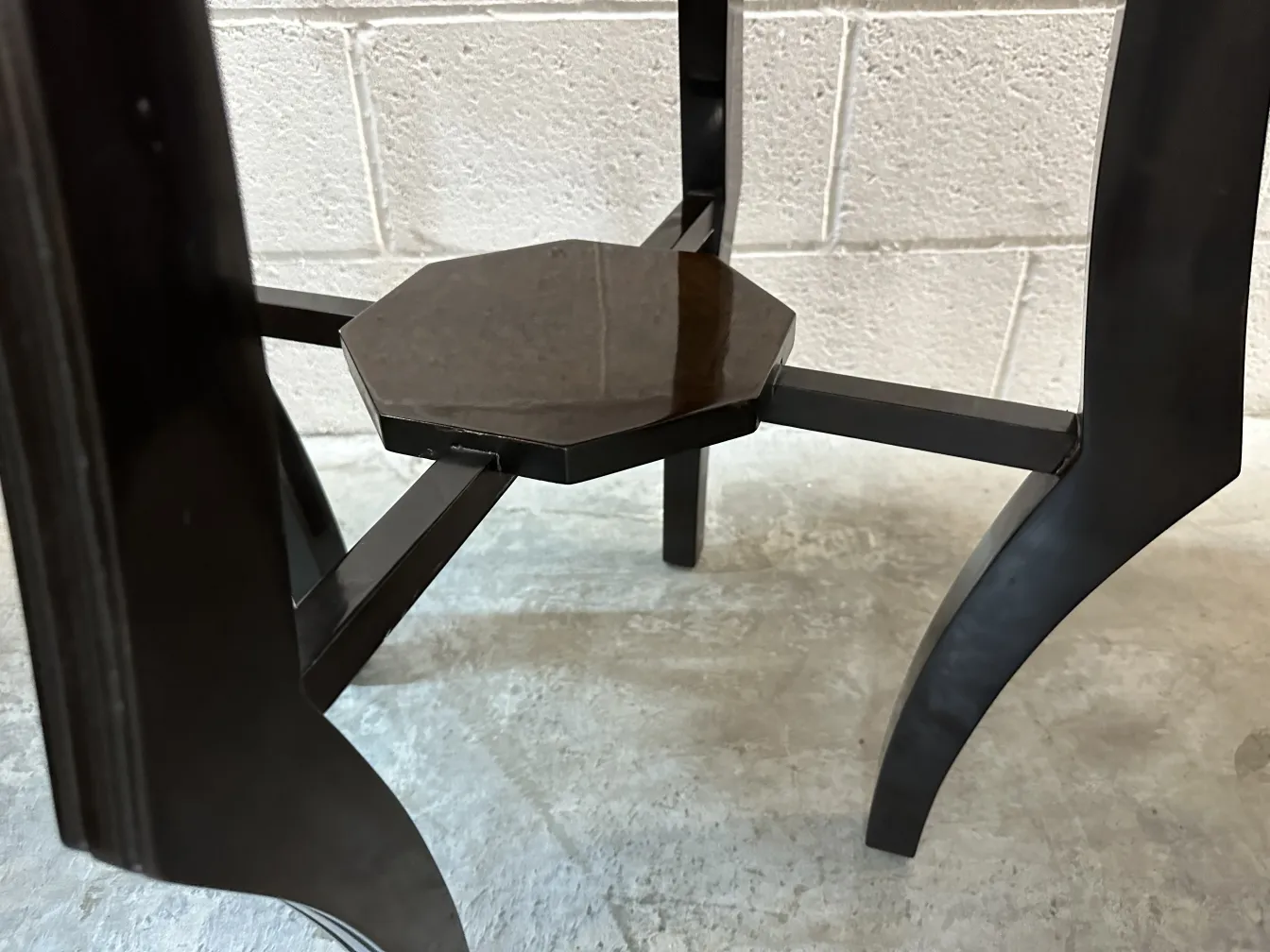 antique small table with octagonal base, minimalist setting