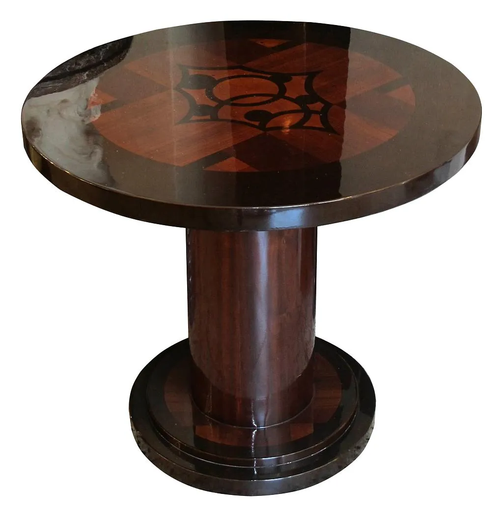 antique round small table with decorative details