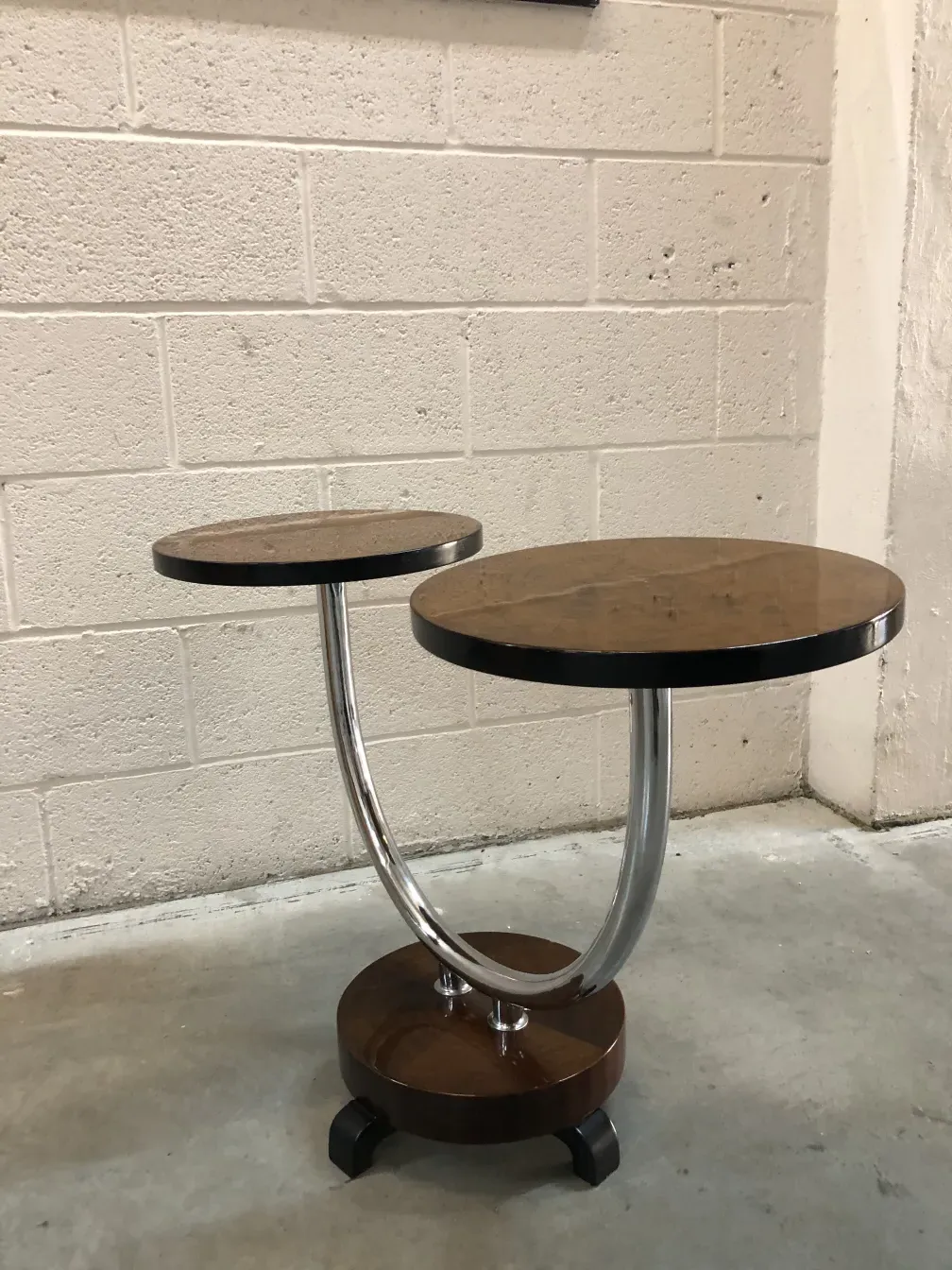 antique two-tier small table with metal legs